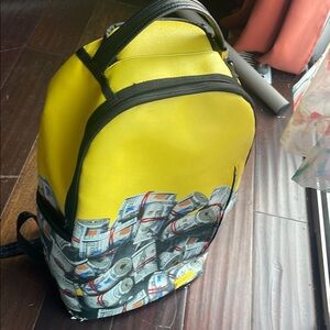 sprayground book bag.